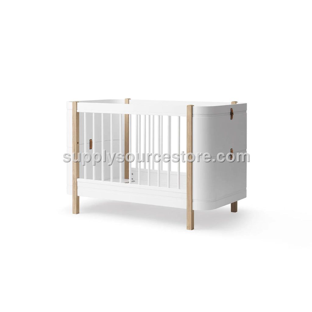 Wood Mini+ Cot Bed Incl. Junior Kit - White/Oak (0-9 Years)